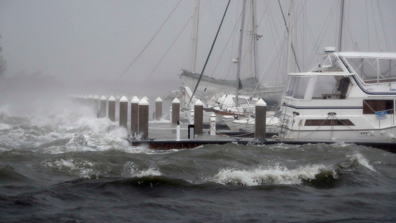Waves from Hurricane Matthew batter a boat dock Friday, Oct. 7, 2016, in St. Augustine , Fla. Matthew was downgraded to a Category 3 hurricane overnight, and its storm center hung just offshore as it moved up the Florida coastline, sparing communities its full 120 mph winds. (Image: AP)